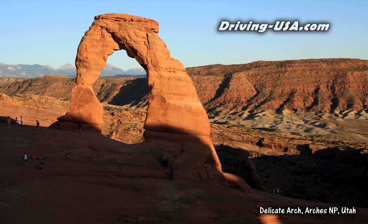 Hikers at Delicate Arch